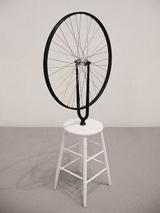 Duchamp's famous readymade, <i>Bicycle Wheel</i>, set an example of art marking for many that utilized found, discarded, and repurposed objects in their work.