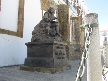A statue of Francisco de Zurbarán located outside the Church of Our Lady of Granada on the southern side of the Plaza de España in the town of Llerena, Extremadura, Spain