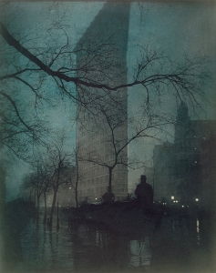 <i>Flatiron Building</i> (1904) Here, in one of three different colorized versions of the same print, Steichen's aim was to capture something of the nuances of light in the early hours of the New York evening.